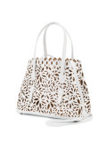 perforated floral shoulder bag