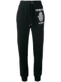 hamsa hand trackpants