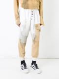 distressed patched track pants