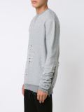 distressed sweater