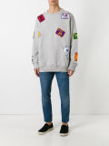 multi patched sweatshirt 