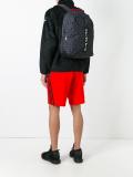 HU triangle print backpack