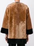 collarless buttoned jacket