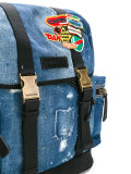 patch distressed denim backpack