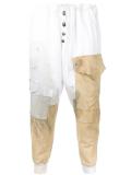 distressed patched track pants