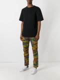 camouflage print trousers 