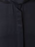 sleeveless wrap neck shirt