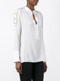 buttoned shoulder detail blouse