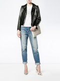 spike embellished clutch bag