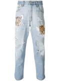 tiger embroidered distressed jeans