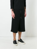 layered oversized track shorts 