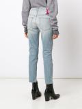 distressed slim jeans
