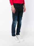 distressed tapered jeans