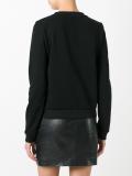 lion studded jumper