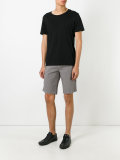 shorts with button closure flap pockets