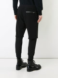 layered track pants 