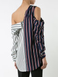 long-sleeve button-down top with open shoulders