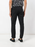 zipped pockets trousers 