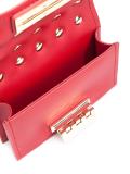 flower embellished clutch