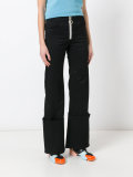 exaggerated hem trousers