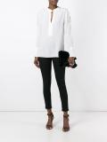 buttoned shoulder detail blouse
