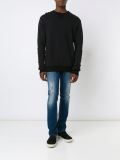 distressed sweater