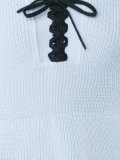 ruffled lace-up V-neck top