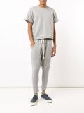 drop-crotch track pants