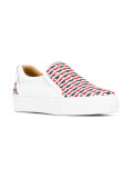crossed slip-on trainers