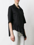 ruffle hem polo shirt