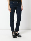 lion head skinny jeans 