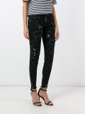 Super Skinny distressed jeans
