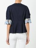 ruffled shortsleeved blouse
