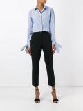 Gancino flip lock trousers