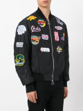 patched bomber jacket