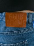 racing stripe tapered jeans