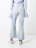 distressed flared jeans
