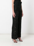 lace-embroidered trousers
