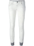 splatter skinny jeans 
