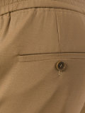 elasticated tapered trousers