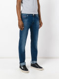 stonewashed slim-fit jeans