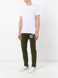 patch embellished trousers