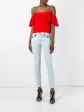 flower appliqué skinny jeans