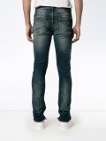 distressed effect skinny jeans