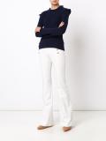 button detailing flared trousers