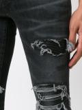 distressed skinny jeans