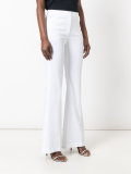 flared high-waisted trousers