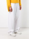 elongated track pants