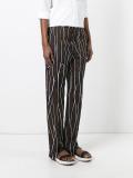 Trellis print trousers