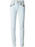 flower appliqué skinny jeans